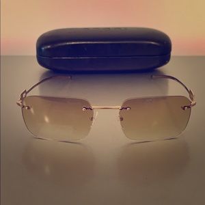 Gucci Sunglasses with rhinestones on the side